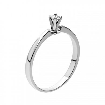 Anillo solitario con un diamante central de 0.06 ct